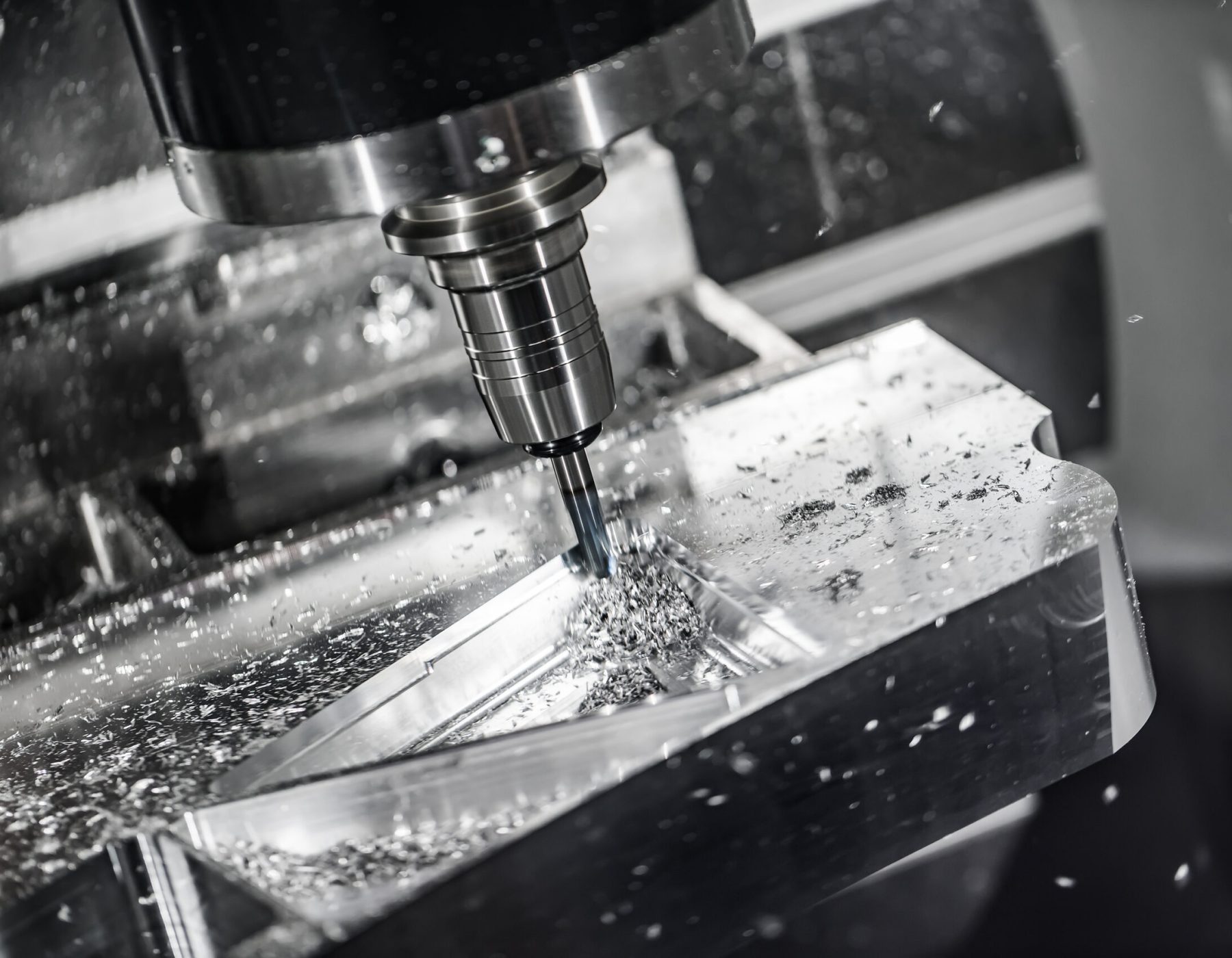 Metalworking CNC milling machine. Metalworking CNC milling machine. Cutting metal modern processing technology. Small depth of field. Warning - authentic shooting in challenging conditions. A little bit grain and maybe blurred.